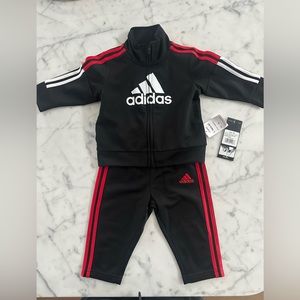 Adidas track suit. New